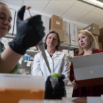 From left: UofL research technician Rachel Ferrill, REACH program manager Sarah Andres and Senior Director of Innovation Programs and New Ventures Jessica Sharon in a lab at UofL.